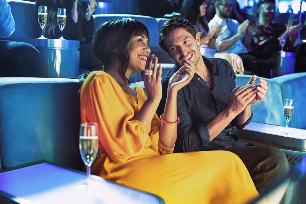 A couple enjoying a show on an MSC Cruise ship